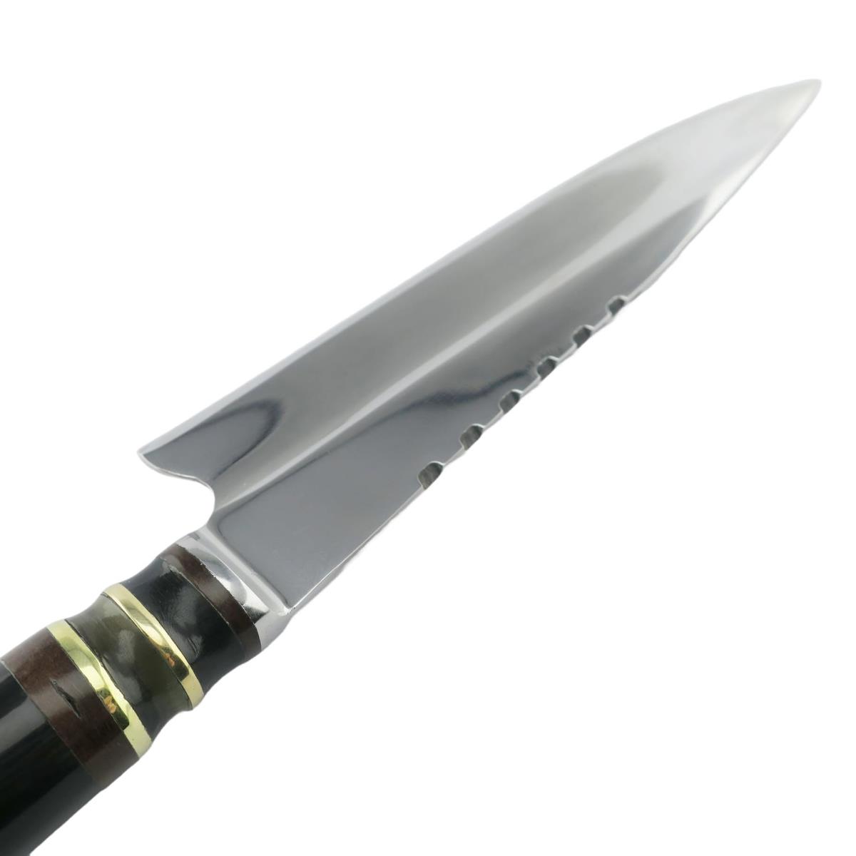 Close-up of a Cow 6.3 inch Dark stainless steel knife with a sharp, polished blade and a decorative handle featuring dark wood and brass bands, ideal for various kitchen tasks.